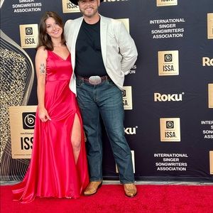 Size 5 red evening gown with leg slit.